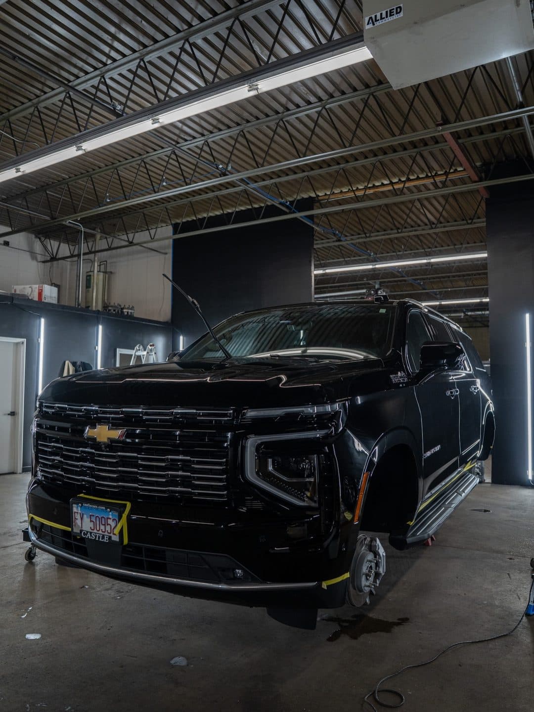 2026 Chevy Suburban High Country, gold ceramic package at Woks Detailing, photo 10